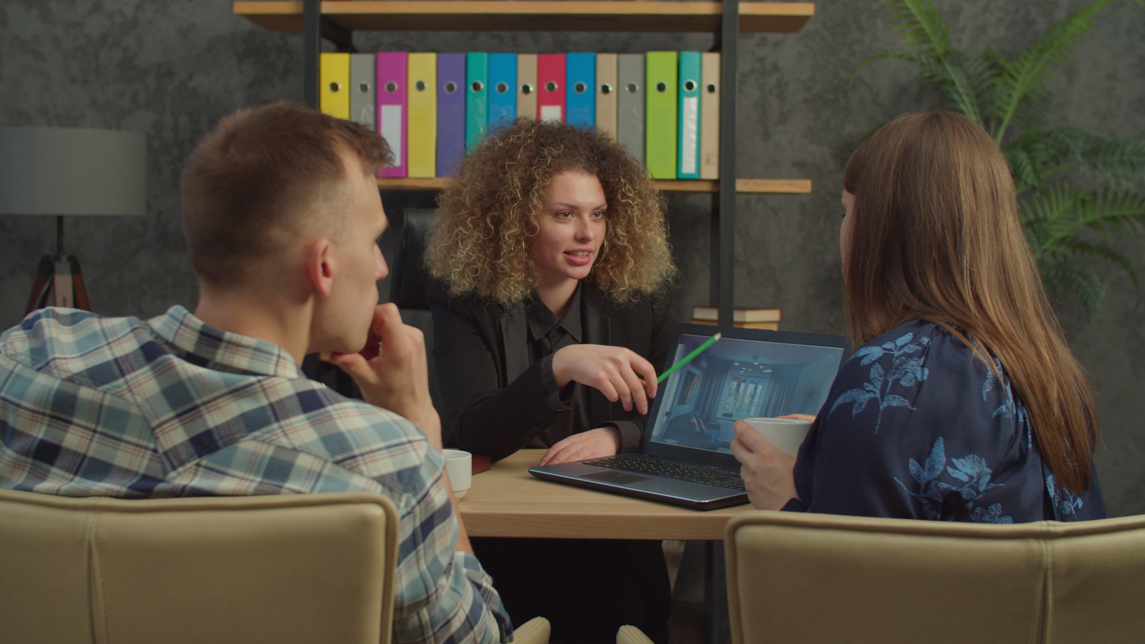 Two people in a financial meeting